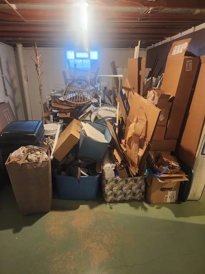 Roll-off dumpster container at job site for Yard Waste Dumpster Rental in Pukalani